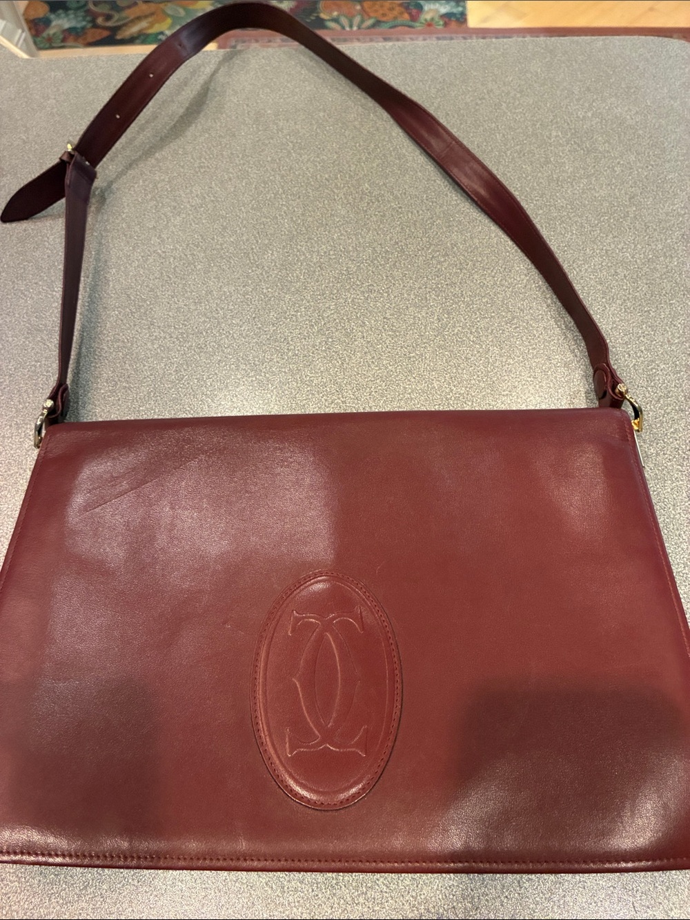 Cartier Burgundy Leather Shoulder Bag with Embossed Logo